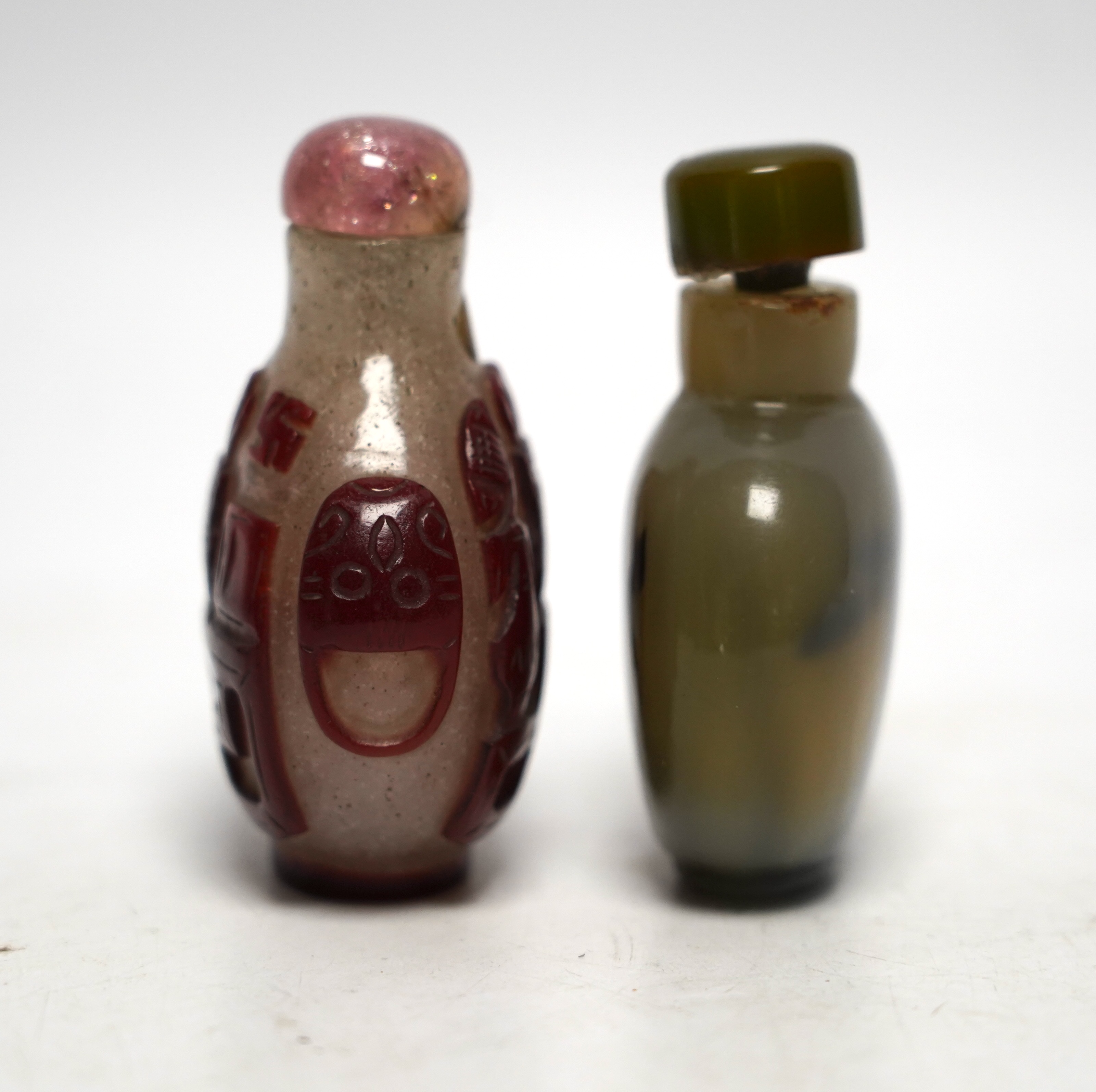 Two Chinese glass snuff bottles, 19th century, largest 7cm high